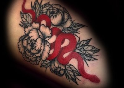 Illustrative flower with snake tattoo